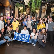 For twins Steve '12 and Don '12 Hopkins (pictured with Waltham Fire Chief Randy  Mullin '96), the firefighter commitment to community is as strong as their  brotherly bond. While they were three-sport