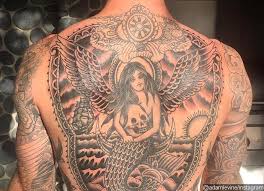 Test drive your next tattoo with the most realistic, custom temporary tattoos available. Adam Levine Debuts Giant Back Tattoo Which Took Six Months To Finish