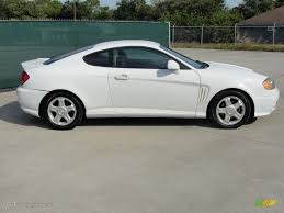 Image result for Alpine Noble White 2001 Tiburon