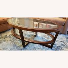 Raymour and flanigan coffee tables and end tables. Raymour Flanigan Oval Two Tier Glass Wood Coffee Table Aptdeco