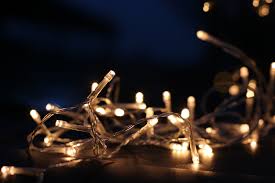 Hang patio lights using planters and wood posts. 5 Ways To Decorate Your Vacation Rental Christmas Five Star Properties