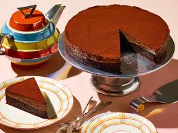 Finished with a dark chocolate ganache and white and dark chocolate curls. The Chocolate Cake That Saved My Vacation The New York Times