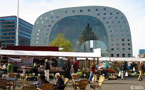Visit the indoor market and go grab a bite at one of many restaurants. Markthalle In Rotterdam