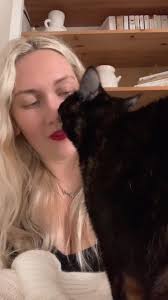Emily Singing to Cat