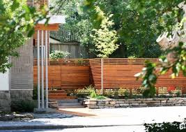 A solid fence with wooden garden privacy fence and trees to lin it up. Wooden Fencing A Fabulous Decoration For Every Home