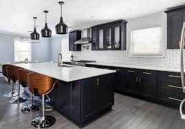 Kitchen With Black Cabinets White Quartz Countertop And Wood Style Porcelain Tile Floor Small Kitchen Cabinet Design Black Kitchen Cabinets Black Kitchens