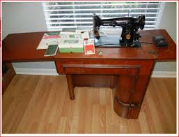 Find great deals on ebay for vintage singer treadle sewing machine. Puzzling Gizmo And Cabinet With A 1940 Singer Quiltingboard Forums