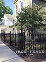 Have a uniquely curved yard and still struggling with the solution? Worried About Installing An Iron Fence Down A Hill Or Slope So Long As Its Not Too Severe You Can Stair Step The F Iron Fence Aluminum Fence Backyard Fences