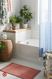 See how these petite baths were completely transformed while keeping cost and style in mind. Revive Your Bathroom On A Budget With New Patterns Fresh Textures Faux Greenery Bathroom Decor Bathrooms Remodel Budget Bathroom