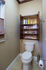 Just make a rectangular tray like shape using plywood sheet and then install the mirror! Small Space Bathroom Storage Ideas Diy Network Blog Made Remade Diy