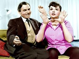 Directed by george cukor norman maine, a movie star whose career is on the wane, meets showgirl esther blodgett when he drunkenly stumbles into her act one night. Watch A Star Is Born Judy Garland Vs Lady Gaga