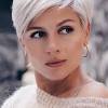 A pixie cut is a very short wispy hairstyle that can be textured and razored, and is short on the back and sides and usually longer on the top. 1