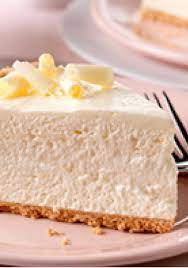 Fluffy White Chocolate Cheesecake A Filling Of Cream Cheese White Chocolate Flavor Pudding And Whipped Topping I Desserts Cheesecake Recipes Dessert Recipes