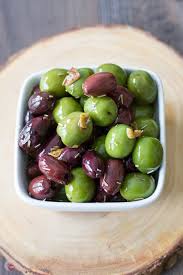 Olives Are The Perfect Snack For Day Or Night These Olives Marinated In Olive Oil And Balsamic Vinegar Are Pe Marinated Olives Balsamic Marinade Olive Recipes