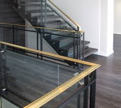 Steel glass railing installation for balcony full process video. Spirit Ironworks Modern Glass And Steel Railing With Brass Handrails