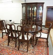 Dining table with trestle $1,750. Lot Ethan Allen 8 Piece Cherry Dining Room Set 2 Piece China Cabinet With A Mirrored Back Glass Shelves And A Lighted Interior Table Measuring 44 X 66 1 2 Inches Plus Two 18 Inch Leaves And 6 Chairs