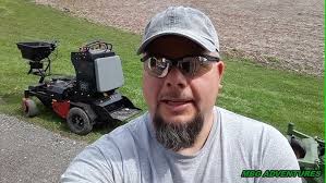 Spreader for stand-on Wright Mowers, hitch mounted spreader