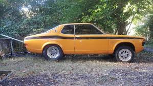 Image result for Bright Yellow 1976 Colt