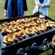Outdoor Cooking Lobster Pork Chops Mussels Seafood All On The Blackstone Products Griddle Griddle Recipes Outdoor Griddle Recipes Griddle Cooking Recipes