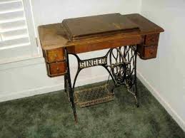 This sewing machine had been sitting in the. Antique Singer Sewing Machine In Cabinet