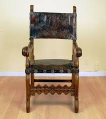 A Fine And Rare 17th Century Late Renaissance Period Spanish Colonial Frailero Armchair With Original Hand Tooled And Embossed Leather Back And Seat Toget