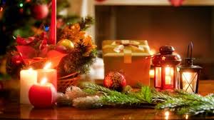 Closeup Video Of Beautiful Decorated Christmas Table With Candles And Gifts Against Glowing Christmas Tree And Burning Fireplace Stock Video C Kryzhov 212030992