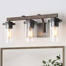Pendant lights make great focal points and conversation pieces when you have guests over. Laluz Bathroom Vanity Light Fixtures 3 Light Farmhouse Vanity Light With Clear Glass Shades Faux Wood 20 L X 6 3 W X 8 7 H Amazon Com