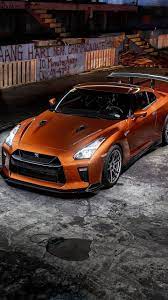 Orange Sports Car Nissan Gt R 720x1280 Wallpaper Nissan Gtr Nissan Gt Gtr