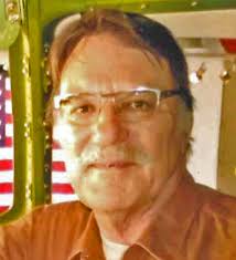 Leslie “Les” E. Spellman