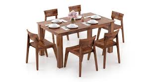 Enjoy free shipping on most stuff this villani wood table offers stylish beauty to your dining area with our wonderful pedestal wood set a stylish and rustic anchor in the heart of your home with our white rectangle dining room table. Arabia Gordon 6 Seater Dining Table Set Urban Ladder