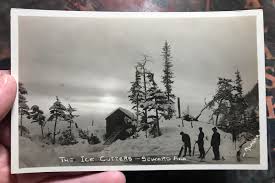 Ice cutters and ice houses with sawdust ...