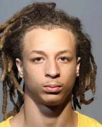 19-year-old TYRELL HOLMES from Seminole County was booked