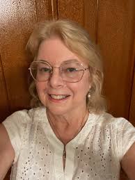 What is the type of tree with yellow leaves and marble-sized fruit?