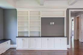 Built In Media Cabinet With Off Center Tv Built In Closed Cabinets And Open Shelve Built In Shelves Living Room Bookshelves In Living Room Built In Tv Cabinet