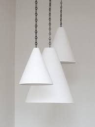 trending on remodelista the lighting trend you need to know about gardenista in 2021 cone pendant light pendant light hanging lights
