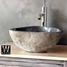 sinks. bathroom sink, stone basin
