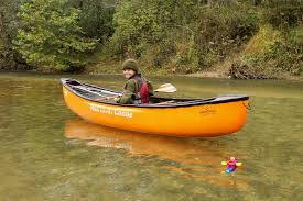 What is exact difference between a kayak and canoe?