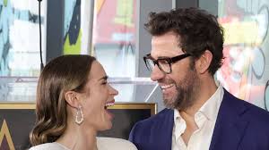 Emily Blunt and John Krasinski can't keep their hands off each other at star studded date night