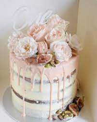Beautiful Drip Cake With Flowers And Macaroons On Top First Birthday Cakes Birthday Cake Decorating Beautiful Birthday Cakes