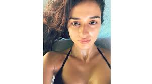 The three sides of me. Disha Patani Posts Stunning Picture In Black Bikini On Her Verified Instagram