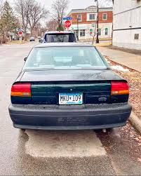 Image result for Black Gold 1995 Saturn