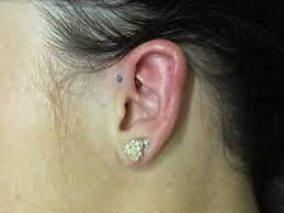 I only want to take the bar out to clean it and put it back in but it just won't unscrew? How To Care For A Helix Or Forward Helix Piercing Tatring
