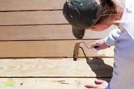 Solid color stains are notorious for failing prematurely, especially on the deck floors. How We Restained Our Wood Deck Deck Cleaning Prep And Staining Mama Needs A Project
