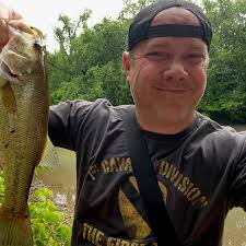 Well, caught two small bass, BUT that's two small bass! Little orange  spinner bait. I'll take it! The kiddo only caught a snake. 😬 #river  #largemouthbass #bass