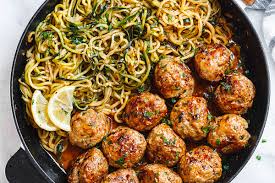 In a large bowl, combine ground turkey, breadcrumbs, onion, egg yolks, garlic, lemon zest, oregano, cumin, salt and pepper, to taste. Garlic Butter Turkey Meatballs With Lemon Zucchini Noodles Recipe Turkey Meatballs Recipe Eatwell101