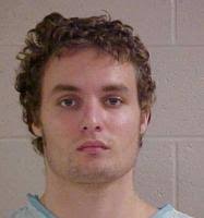 Alleged Rainier Police chief killer disrupts arraignment