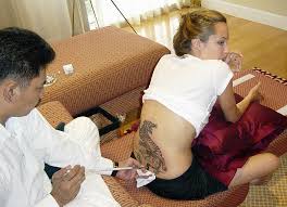 The meaning of these tattoos can be traced in several directions when the layering of new over old tattoos is considered. Angelina Jolie S Tattoos And The Sweet Meanings Behind Them Hello