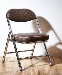 Pin By Theunsayableone On Absolute Absurdity Folding Chair Chair Vintage Luggage