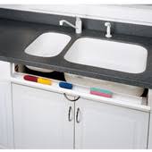 With all these storage options you can finally get all of the clutter off of your kitchen countertops and relax. Sink Trays Tilt Out Sink Cabinet Trays And Sink Tray Organizers At Cabinet Accessories Unlimited