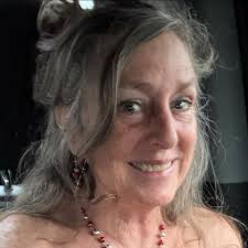 I have this beautiful wooden ladder. It's topically used to hold Indian  blankets. I decided to use it to hold my dvd movies so I made this small  movie nook .